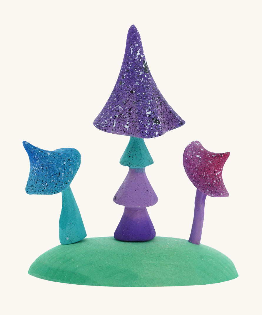 Bumbu Handmade Wooden Enchanted Mushrooms Playset. Three mushrooms on a green coloured base piece. These expertly hand crafted items are part of a large range of wooden toys available here at Babipur. 