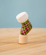 Bumbu red and green Festive Christmas Stocking Celebration decorative Figure to fit on a Grimm's celebration ring. These festive figures are perfect for your Christmas celebration ring set up. These expertly hand crafted items are part of a large range of wooden toys available here at Babipur. 