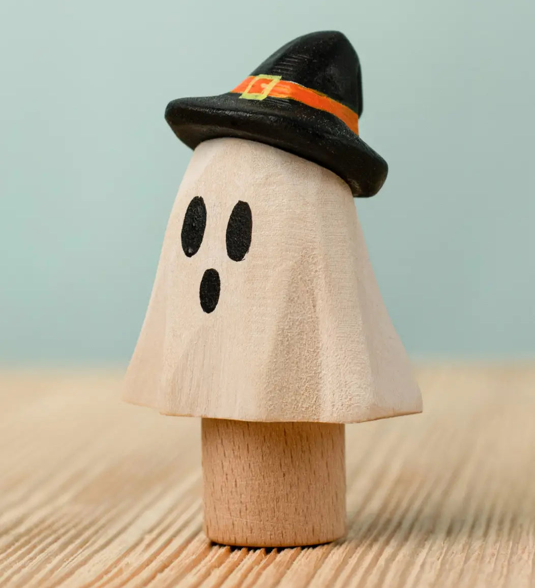 Bumbu handcrafted wooden ghost wizard decorative figure standing inserted on a wooden peg