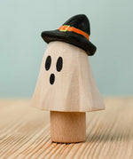 Bumbu handcrafted wooden ghost wizard decorative figure standing inserted on a wooden peg