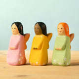 Bumbu handcrafted wooden, cherry, golden and sage fairy figures 