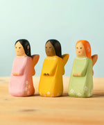 Bumbu handcrafted wooden, cherry, golden and sage fairy figures 