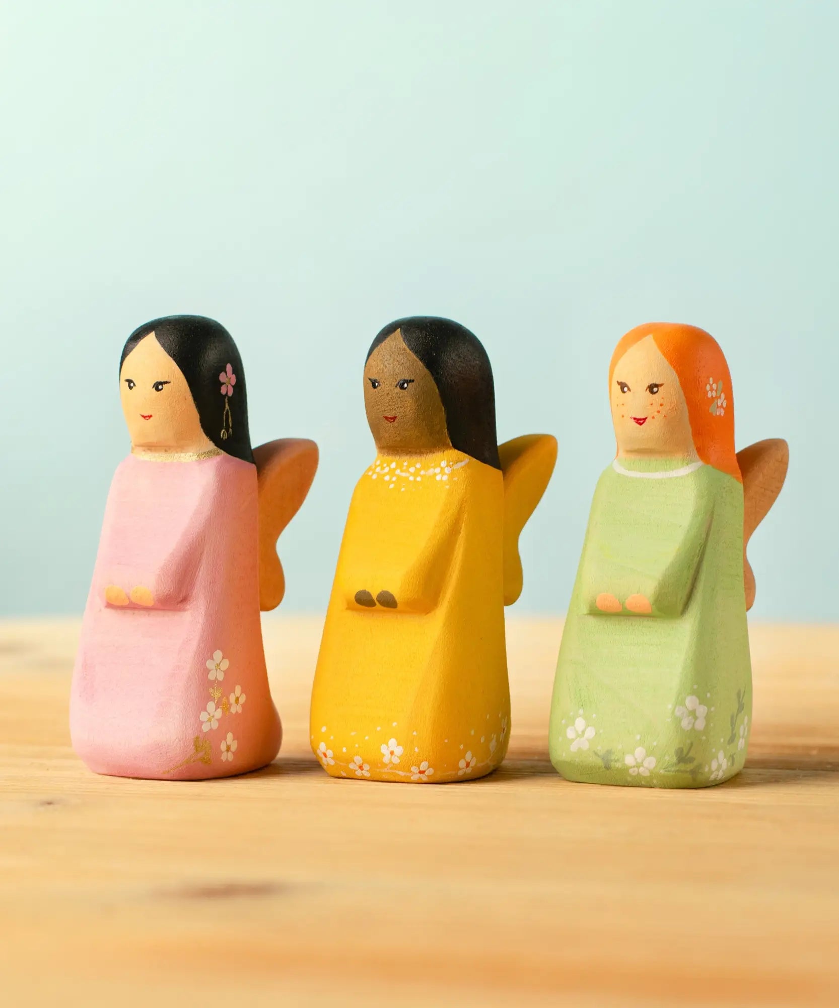 Bumbu handcrafted wooden, cherry, golden and sage fairy figures 