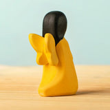 Back of Bumbu wooden golden fairy figure showing golden wings detail