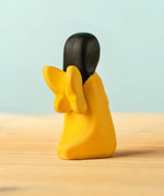 Back of Bumbu wooden golden fairy figure showing golden wings detail