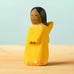 Bumbu handcrafted wooden golden fairy figure with painted black hair, flowers and facial features