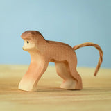 Bumbu toys handcrafted wooden brown standing monkey figure with a cord tail