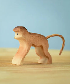 Bumbu toys handcrafted wooden brown standing monkey figure with a cord tail