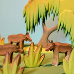 two Bumbu Wooden Banana Bushes place amongst red savanna rocks