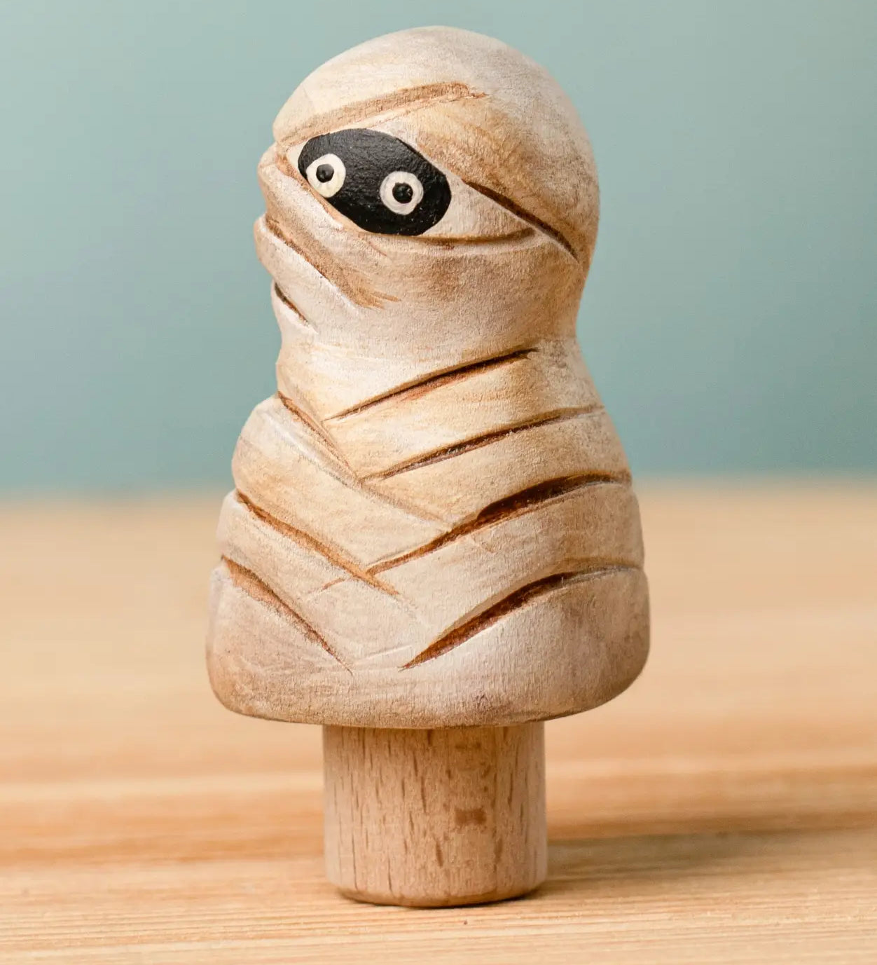 Bumbu handcrafted enchanted mummy decorative figure on a peg showing detailed bandages and painted eyes
