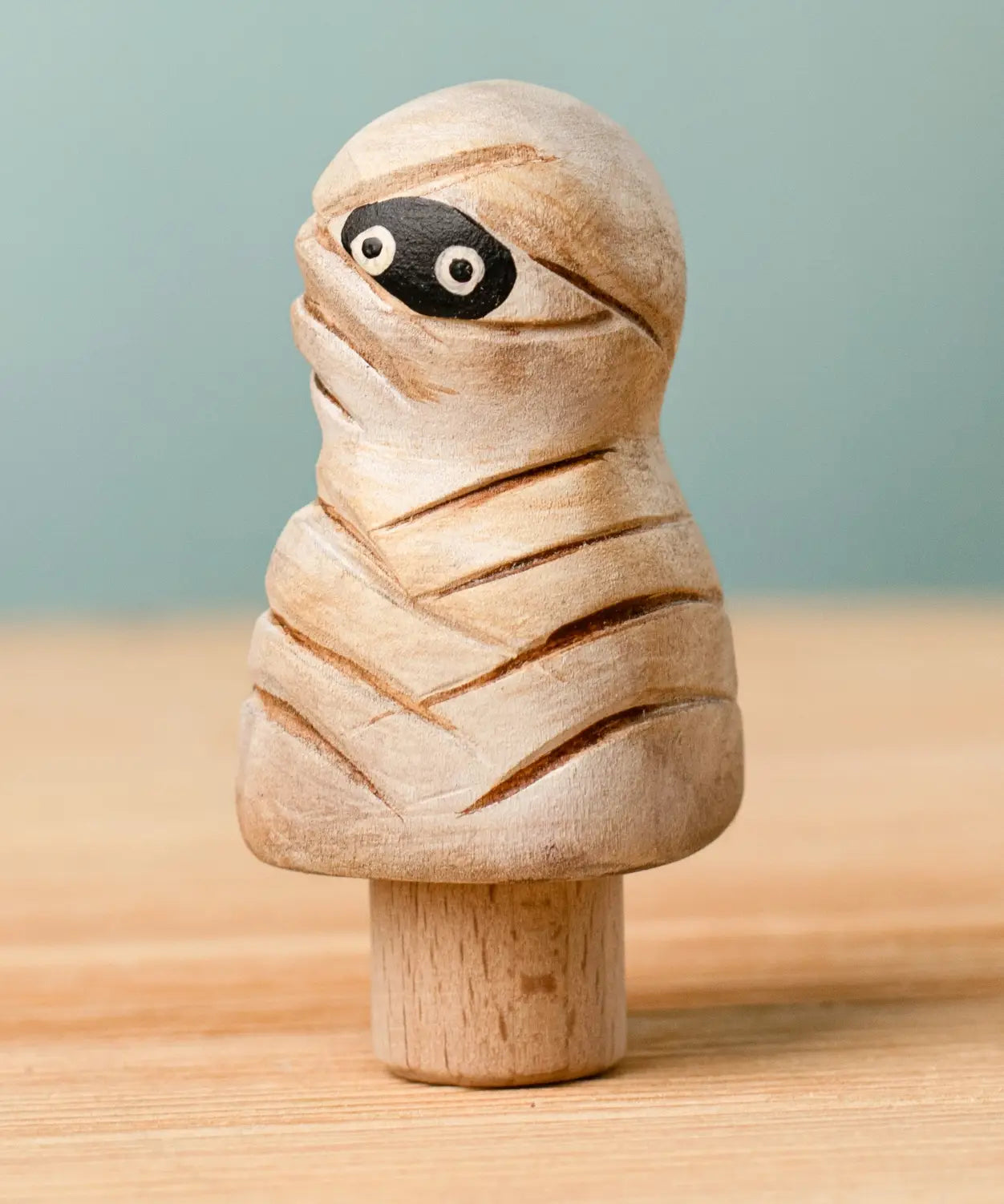 Bumbu handcrafted enchanted mummy decorative figure on a peg showing detailed bandages and painted eyes
