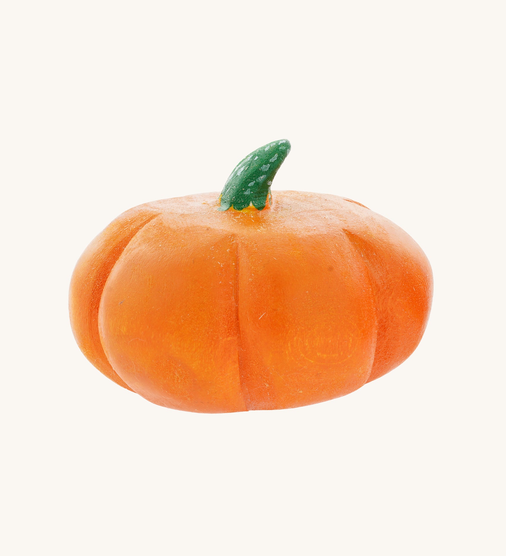 A large Bumbu hand carved wooden pumpkin toy. These expertly hand crafted items are part of a large range of wooden toys available here at Babipur. 