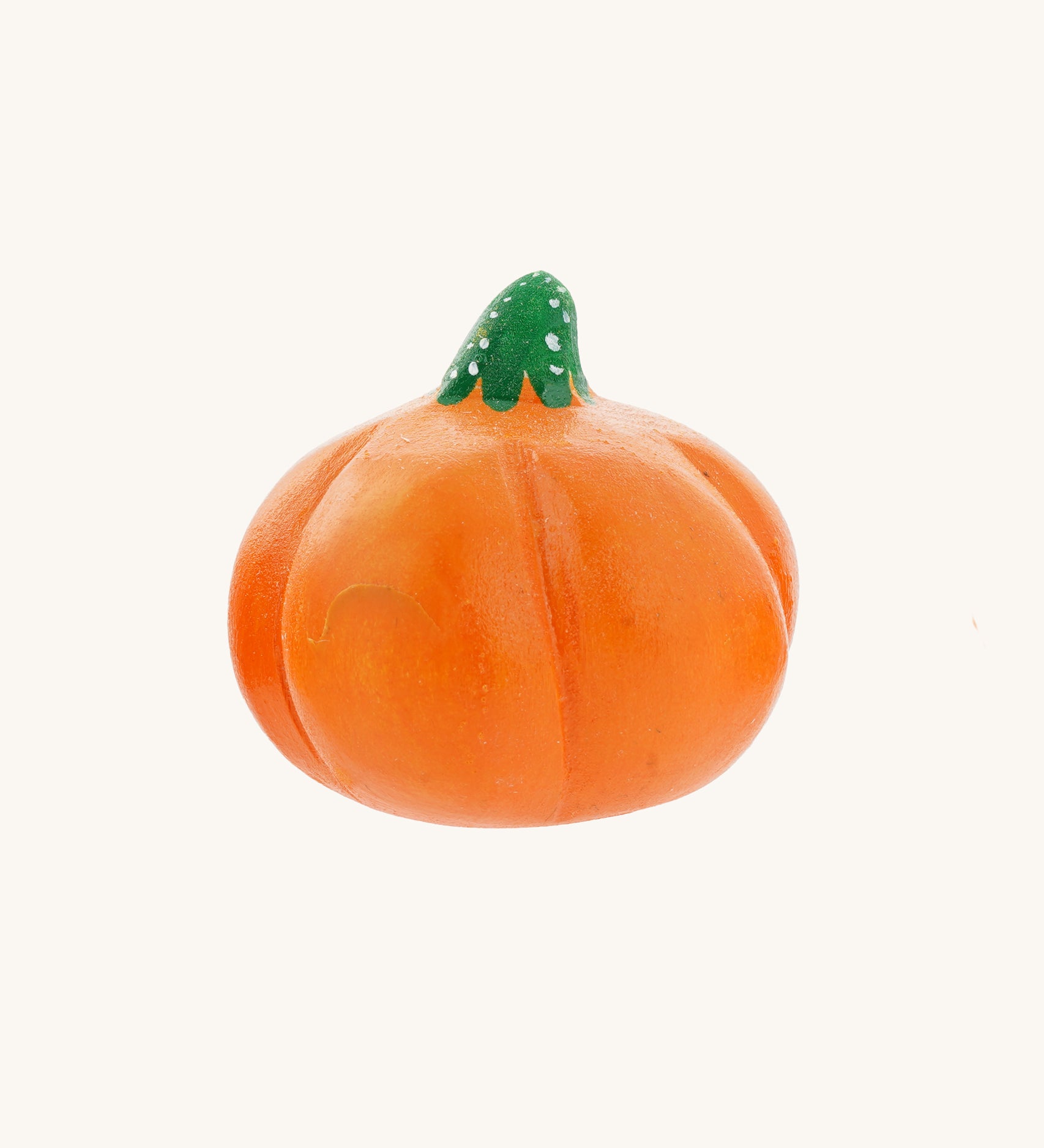 A medium Bumbu hand carved wooden pumpkin toy. These expertly hand crafted items are part of a large range of wooden toys available here at Babipur. 