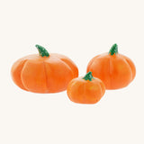 A set of three Bumbu, hand carved wooden pumpkin figures. A large Bumbu hand carved wooden pumpkin toy. These expertly hand crafted items are part of a large range of wooden toys available here at Babipur. 