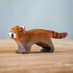 A Bumbu wooden red panda figure
