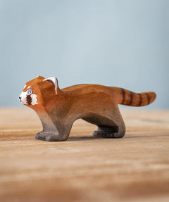 A Bumbu wooden red panda figure