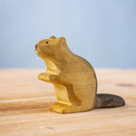 Bumbu wooden sitting beaver figure on a wooden board