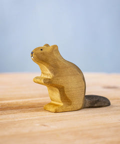 Bumbu wooden sitting beaver figure on a wooden board