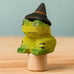 Bumbu handcrafted wooden magical frog decorative figure wearing a witch hat for Halloween decoration.