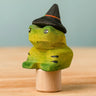 Bumbu handcrafted wooden magical frog decorative figure wearing a witch hat for Halloween decoration.