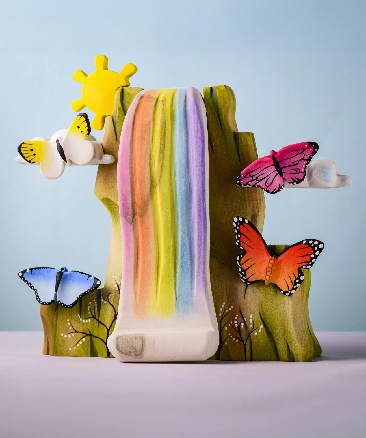 Bumbu wooden Butterflies placed on Bumbu's Rainbow Cliff.