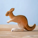 The Bumbu wooden toy kangaroo figure, hand-painted in brown shades.