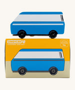 CandyLab blue VW T3 CandyVan with white stripe on the side - side view on top of the original cardboard packaging.