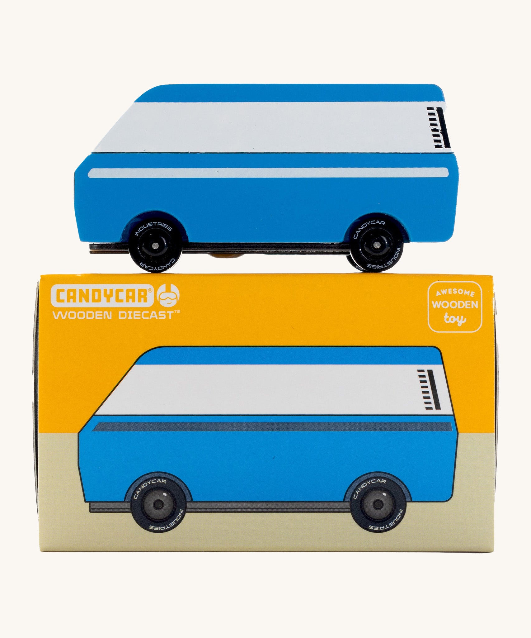 CandyLab blue VW T3 CandyVan with white stripe on the side - side view on top of the original cardboard packaging.