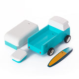 Magnetic pieces of the Candylab handmade wooden toy vehicle on a white background