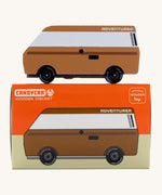 CandyLab brown Volkswagen T3 Campervan - side view, placed on top of its packaging. 