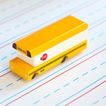 Candylab solid wooden diecast bus toy on some white