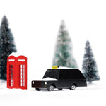 Candylab kids wooden London taxi toy car on a white background