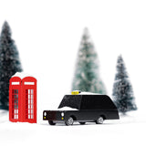 Candylab kids wooden London taxi toy car on a white background