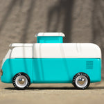 Side of the candylab handmade magnetic beach van toy on a sand background