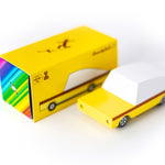 Candylab childrens yellow candycar toy on a white background next to its cardboard box
