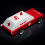 Candylab kids Americana ambulance toy on a shiny black background
