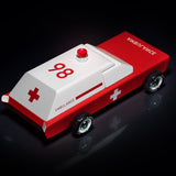 Candylab kids Americana ambulance toy on a shiny black background