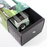 Close up of the Candylab kids wooden diecast suv toy car in its cardboard box on a white background