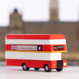 Close up of the Candylab collectable red double decker bus toy on a white background