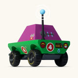 Back of Candylab Dundee wooden diecast adventurer truck with a green body and purple windows and decals