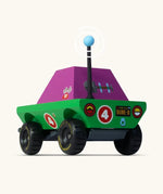 Back of Candylab Dundee wooden diecast adventurer truck with a green body and purple windows and decals