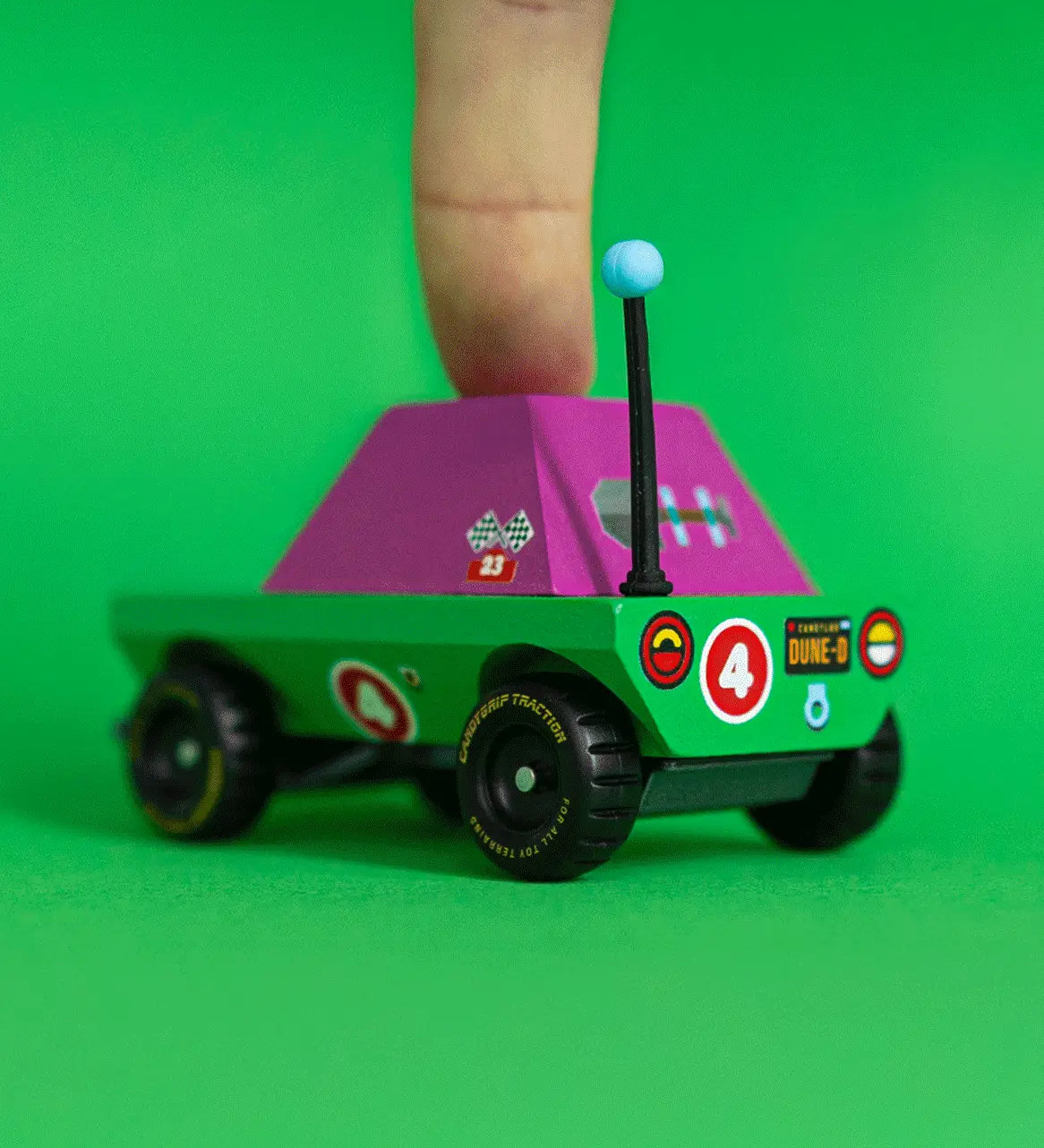 Adult finger on top of the Candylab Dundee adventurer truck showing scale