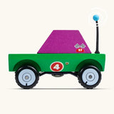 Side of Candylab Dundee wooden diecast adventurer truck with a green body and purple windows and decals