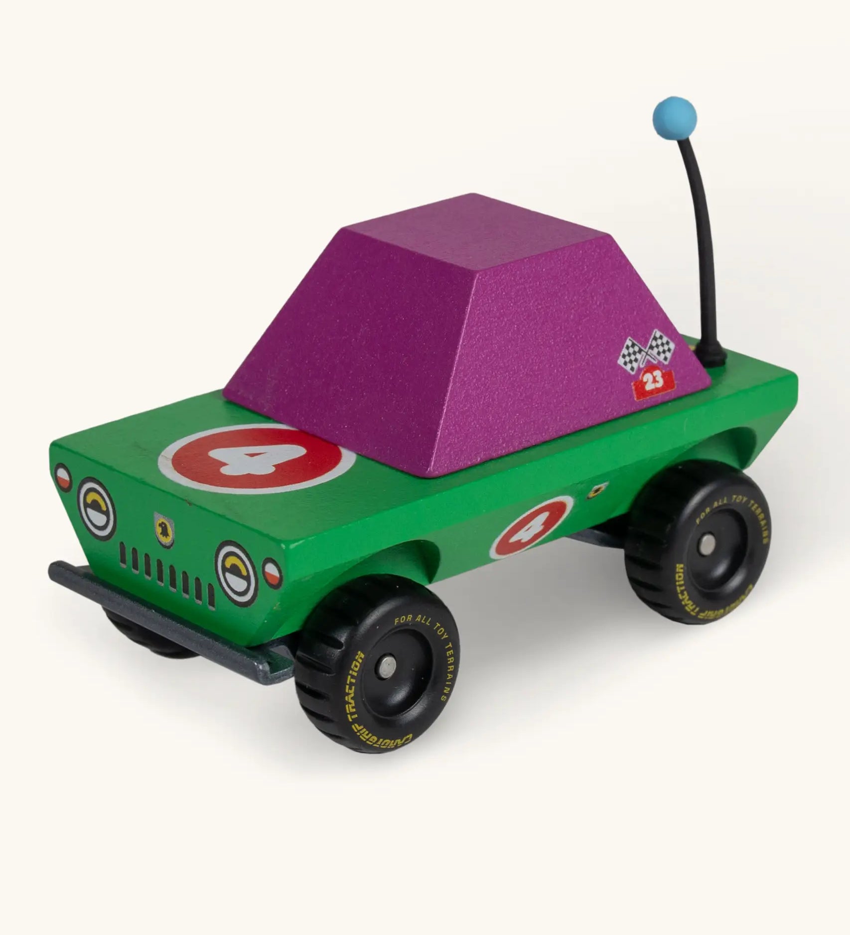 Candylab Dundee wooden diecast adventurer truck with a green body, purple windows and decals