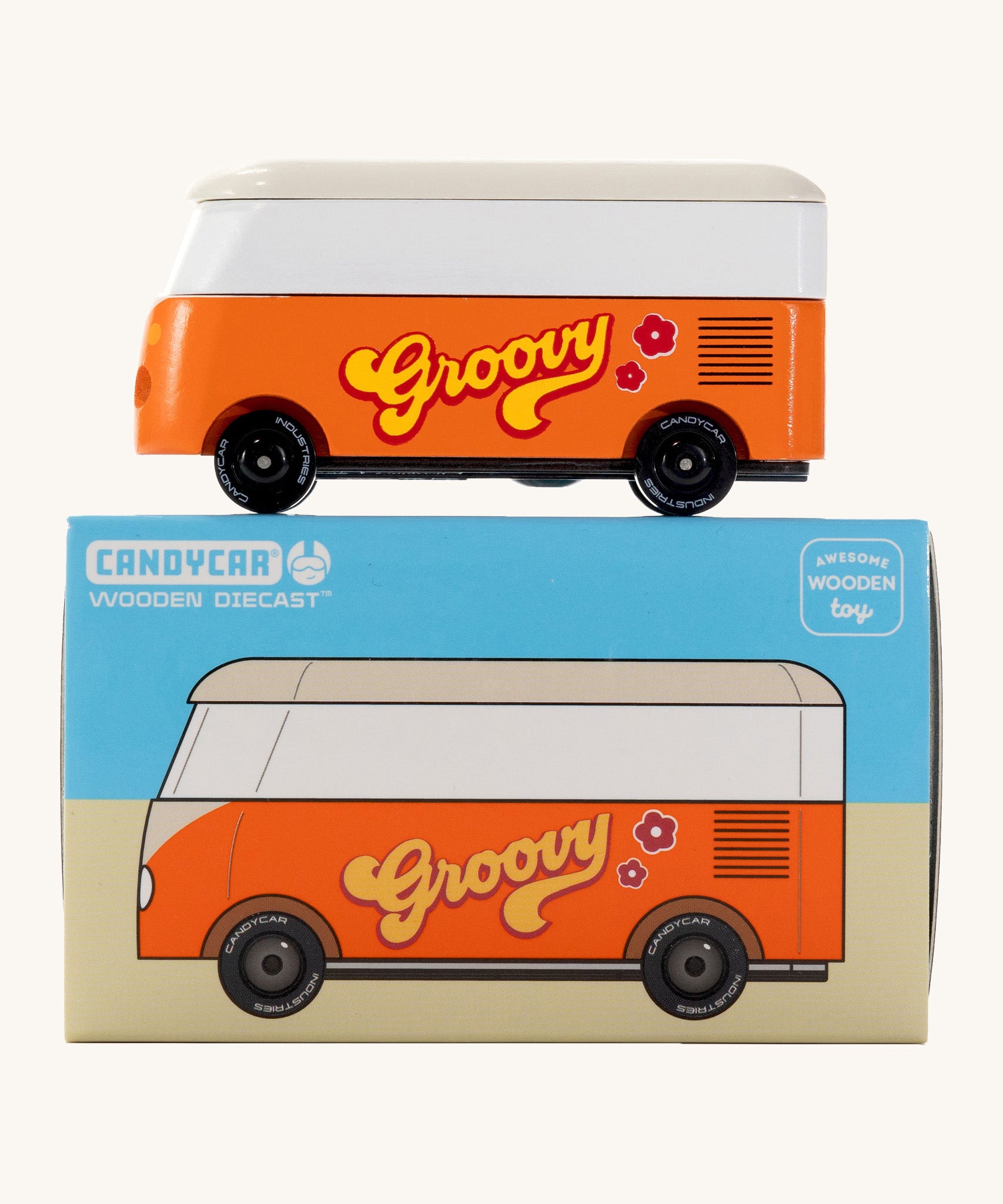 CandyLab orange VW T1 Campervan with 'Groovy' text on the side in a 60s font - side view placed on top of its original packaging.