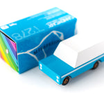 Candylab blue mule wooden car toy on a white background next to its blue box