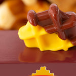 Close up of the miniature waffle on top of the Candylab handmade wooden waffle truck toy
