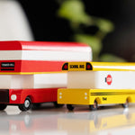 Candylab red London bus and yellow school bus toys on a white background