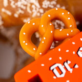 Close up of the giant toy pretzel on top of the Candylab collectable pretzel toy truck
