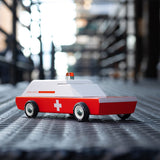 Close up of the Candylab wooden ambulance car on a metal floor